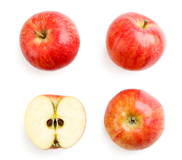 istock Red apple set whole and half on white background, isolated. Top view 1273714181
