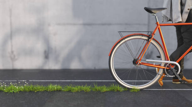 Bicycle leaving a green trail on the asphalt