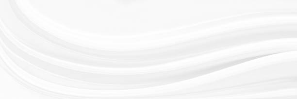 istock White gray satin texture that is white silver fabric silk panoramic background with beautiful soft blur pattern natural. 1273716113