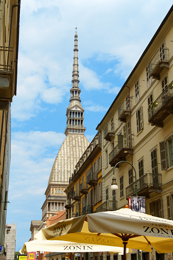 Turin, Italy - August 5, 2019: the Mole Antonelliana was first designed as a synagogue in 1863 and completed in 1889. Today it hosts the Museum of Cinema and its the main symbol of the city.