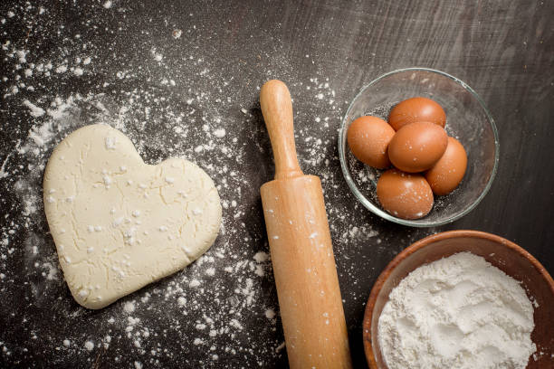 istock Ingredients bakery making on black wooden table 1273717740
