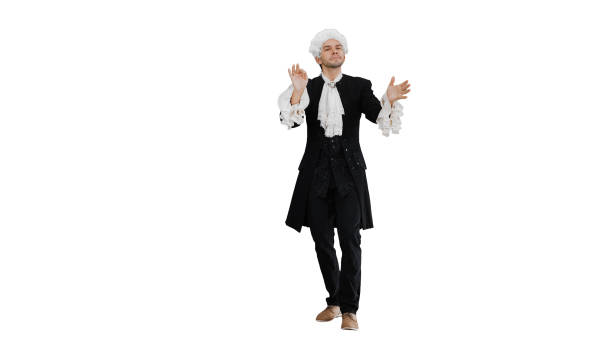 Wide shot. Side view. Man dressed like Mozart conducting expressively while looking at camera on white background. Professional shot in 4K resolution. 047. You can use it e.g. in your medical, commercial video, business, presentation, broadcast