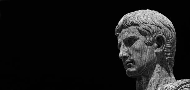 Augustus, first emperor of Ancient Rome (Black and White with copy space) Caesar Augustus, first emperor of Ancient Rome and father of the nation. Old bronze statue along the Imperial Forum Road roman photos stock pictures, royalty-free photos & images