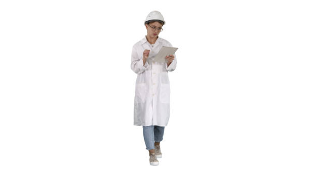 istock Woman engineer working on tablet on white background 1273724826