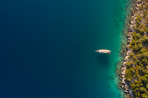 Sailboat on the sea. Taken via drone. Antalya, Turkey.