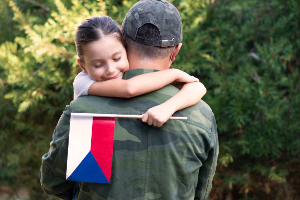 istock Czech Soldier And His Daughter 1273735769