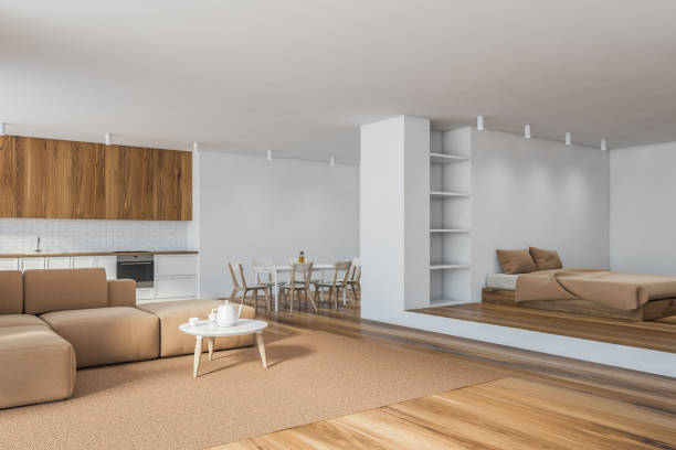 istock White kitchen and living room corner, bed 1273736674