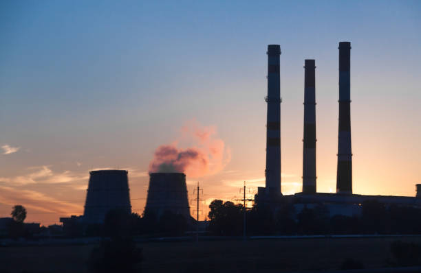 istock refinery industry factory silhouette orange sky sunset background 1273737209