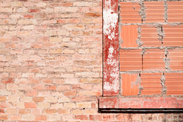 istock View of old building, bricked up window 1273738870