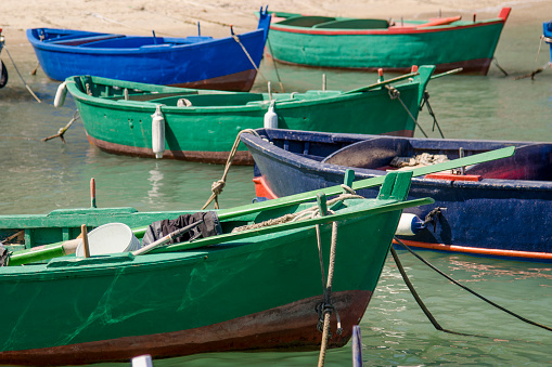 Venice, Italy - July, 14 2023: Stock photo showing close-up view of gondola bows on Venice Lagoon, Venice, Italy.
