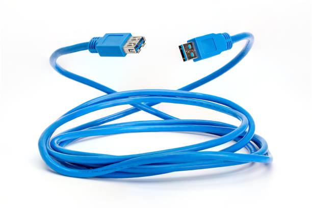 istock Rolled up blue USB 3 extension cable. Type A male to type A female with unconnected plugs 1273740442