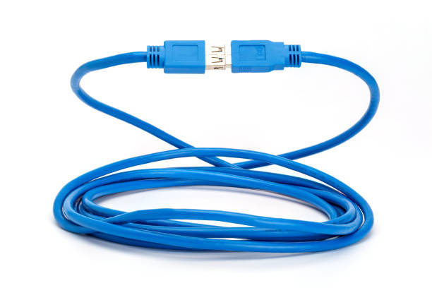 istock Coiled blue USB 3 extension cable. Type A male to type A female with connected plugs 1273740444