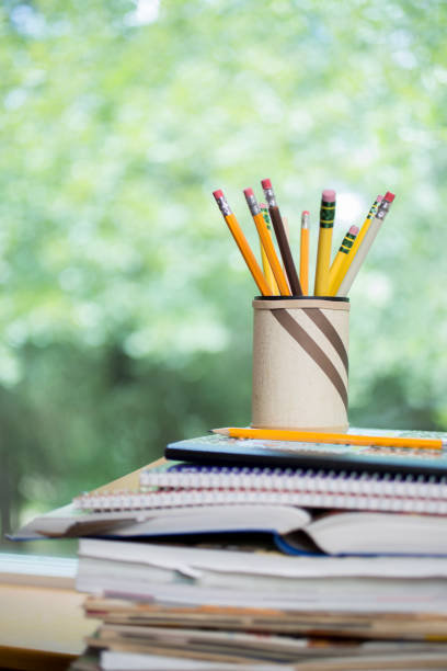 istock Home desk in front of window. 1273750065