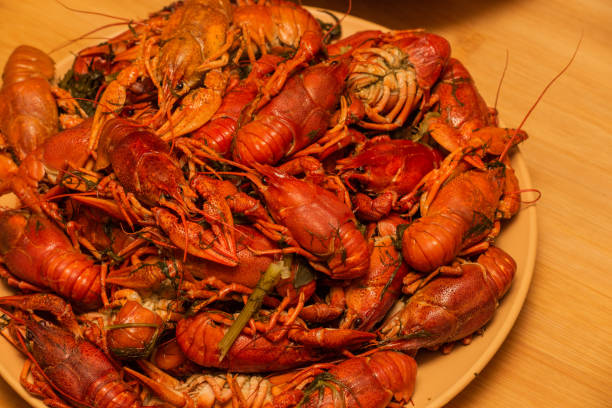 istock Tasty boiled crayfishes on a plate. Boiled crayfish in a plate 1273753023