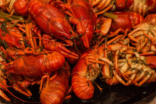 istock Tasty boiled crayfishes on a plate. Boiled crayfish in a plate 1273753032
