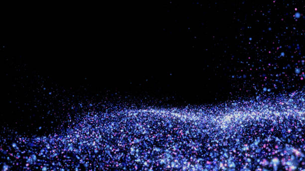 istock Purple stardust particles on black background 1273753451