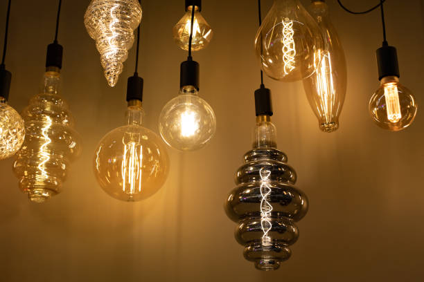 istock Beautiful vintage lamps with filament, set of light sources, backdrop for design 1273753522