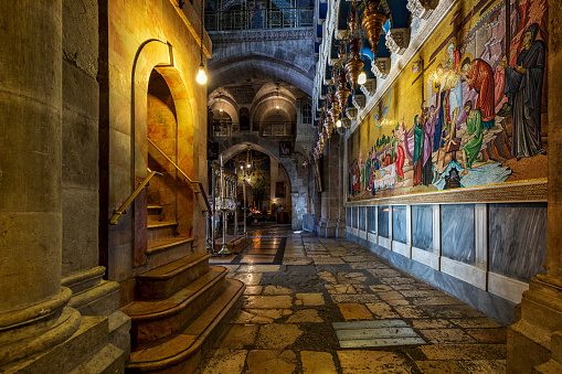 JERUSALEM, ISRAEL - JULY 14, 2019: Interiors of the Church of the Holy Sepulcher - a place known as Calvary or Golgotha, and Jesus's empty tomb, where he was buried and resurrected.