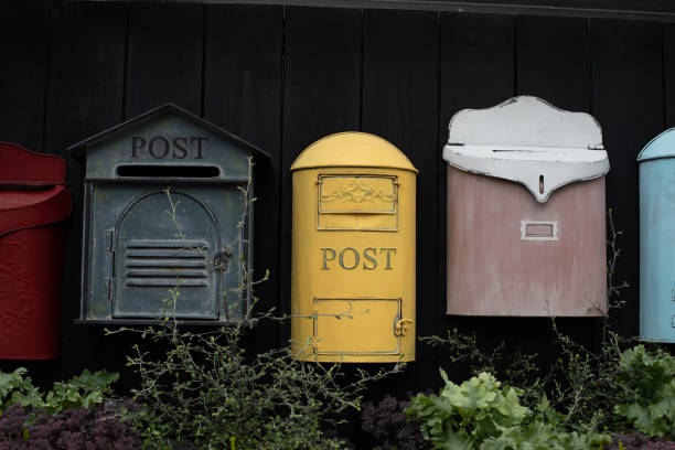 istock Vintage mailbox. Beautiful old-fashioned mailboxes black yellow red. Shabby weathered postbox set 1273755199