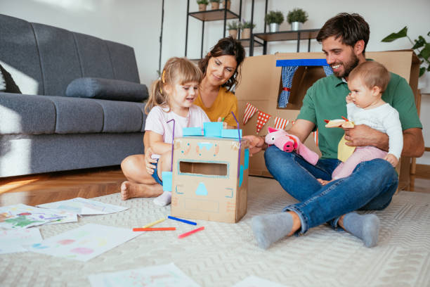 istock Young family at home enjoying being together 1273758637