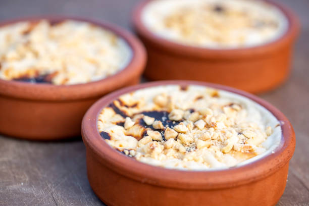 istock Baked rice pudding turkish milky dessert sutlac in earthenware casserole with hazelnuts 1273760426