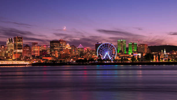 istock Montreal skyline at dusk reflected in St Lawrence River 1273762730