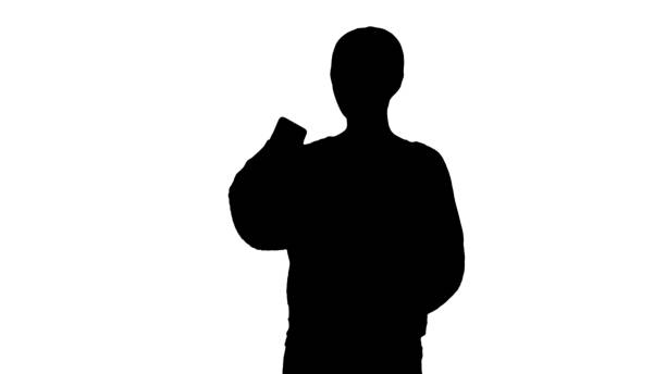 istock Silhouette Smiling and gesturing young woman having video call o 1273774786