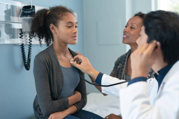 istock Adolescent girl getting check up from the doctor 1273779686