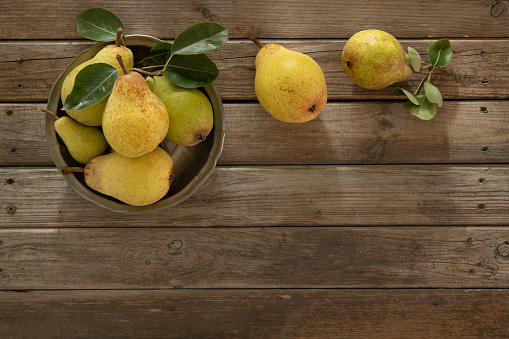 Fresh Organic Pears On An Old Wooden Background