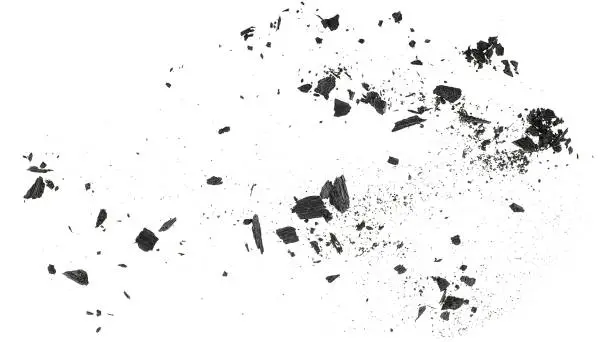 Charcoal dust with fragments isolated on a white background, top view.
