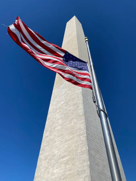 istock Flag at Washington Monument/Ginsburg 1273783669