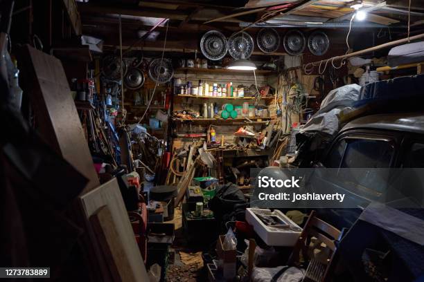 Super Cluttered Garage Full Of Tools And Materials Stock Photo - Download Image Now - Garage, Messy, Hoarding - Concept