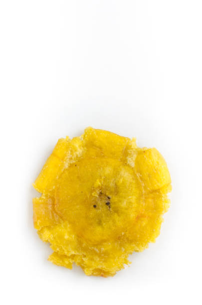 It is a very common Latin America recipe.  The recipe receives several names depending on the geographical area. Some of the most common names are tostones or patacones platano frito, verde frito, chinos and bananas pesées.