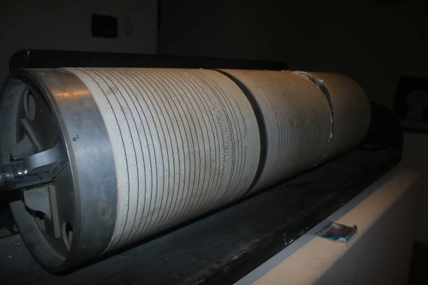 Large paper rolls to write down any seismic activities Three large paper rolls to write down any seismic activities seismologist stock pictures, royalty-free photos & images