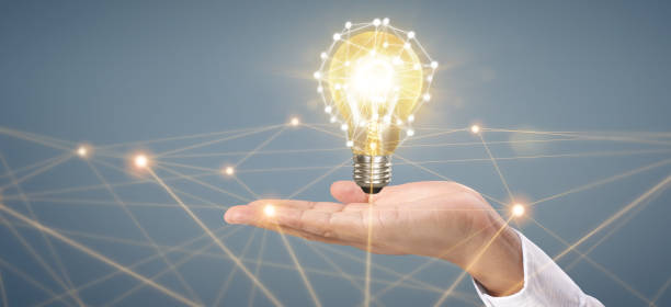istock Hand of holding light bulb. idea innovation inspiration concept 1273789093