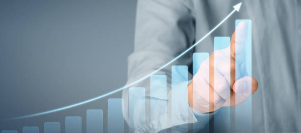 istock Businessman plan graph growth and increase of chart positive indicators in his business 1273789096