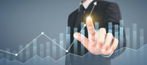 istock Businessman plan graph growth and increase of chart positive indicators in his business 1273789105