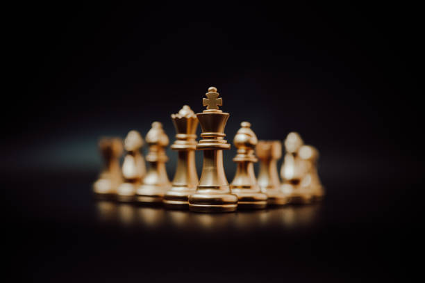 istock Leader and success business competition concept. Chess board game strategy 1273789897