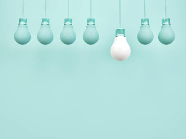 istock Creative idea light bulb symbol on simple pastel blue background with different idea design concept 1273793210