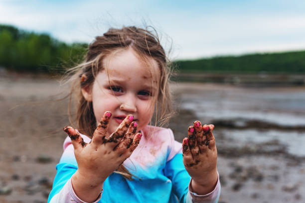istock Girl Explores Shoreline 1273794051