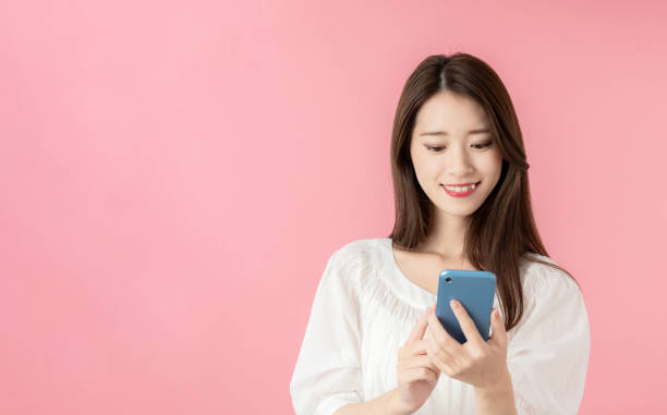 istock Young girl using a smart phone. 1273794116