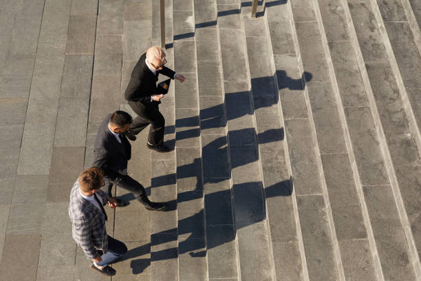 istock Business people moving up 1273800430