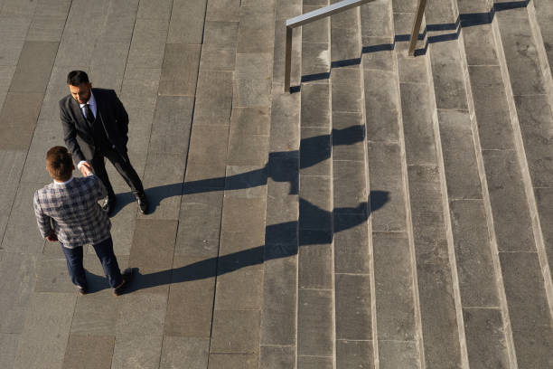 istock Business handshake outdoors 1273800442