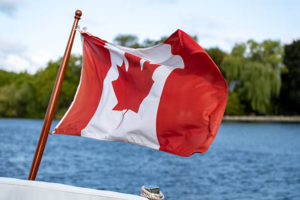 istock Canadian flag flies on boat's stern 1273800630