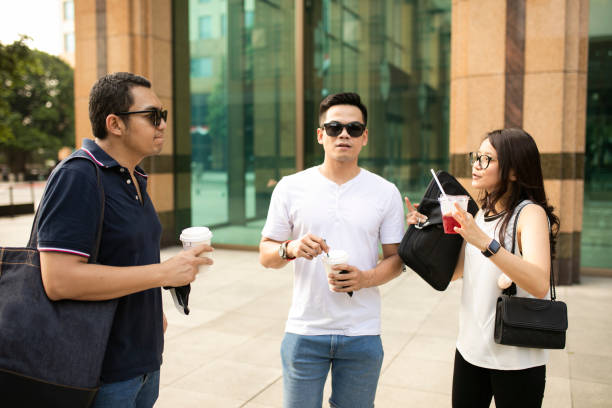 istock Friends talking  and walking at financial district 1273803197