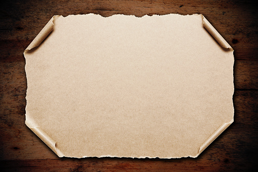 Blank Brown paper notice on wood background textured