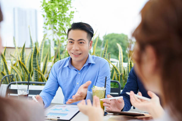 istock Entrepreneur talking to colleague 1273807925