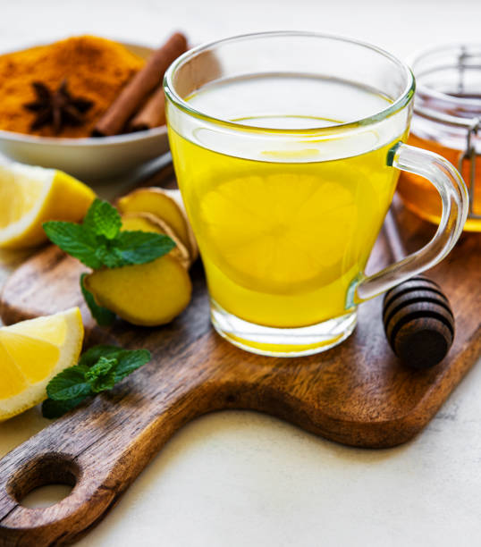 istock Energy tonic drink with turmeric, ginger, lemon and honey 1273808806