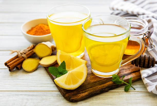 istock Energy tonic drink with turmeric, ginger, lemon and honey 1273808814