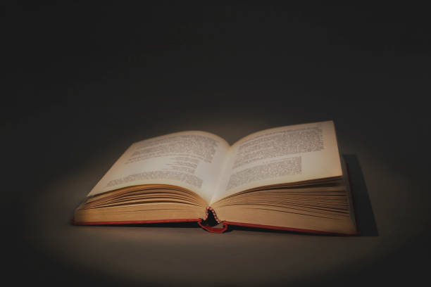 istock concept of wisdom and knowledge, open book that lights up 1273810354